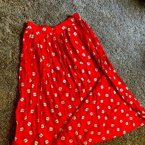Red long pleated skirt